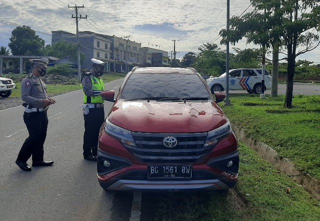 Ajak Pengendara Tertib Tetap Gunakan Masker